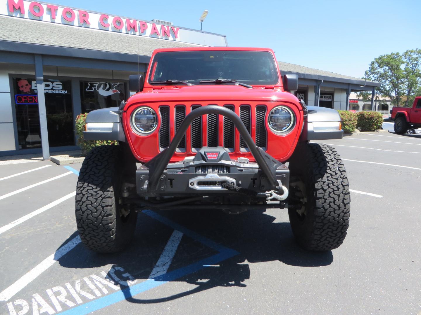 2019 Red /Black Jeep Wrangler Unlimited Rubicon (1C4HJXFN7KW) with an 2.0L L4 DOHC 16V TURBO engine, automatic transmission, located at 2630 Grass Valley Highway, Auburn, CA, 95603, (530) 508-5100, 38.937893, -121.095482 - Rubicon JL ready for all of your offroad adventures. This Jeep is sitting on a Rubicon Express lift kit, RE 2.5 Extreme series shocks, 17" Method bead grip wheels, 37" BFG KO2 tires, EVO front bumper, Warn winch, Road Armor rock slliders, and a HD Jeep spare tire carrier. - Photo#1